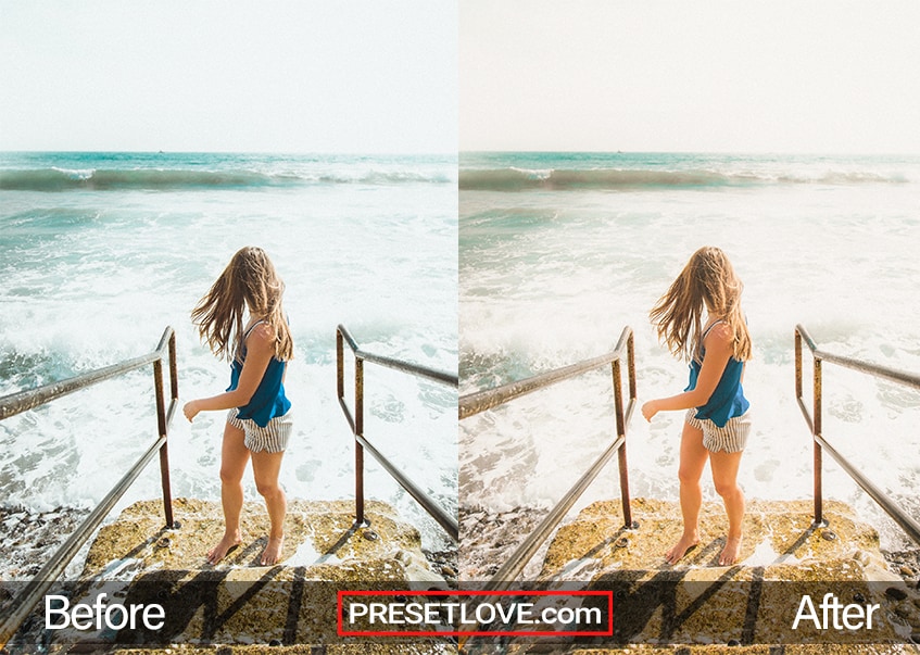 A warm and vibrant photo of a woman climbing up the stone steps at the beach