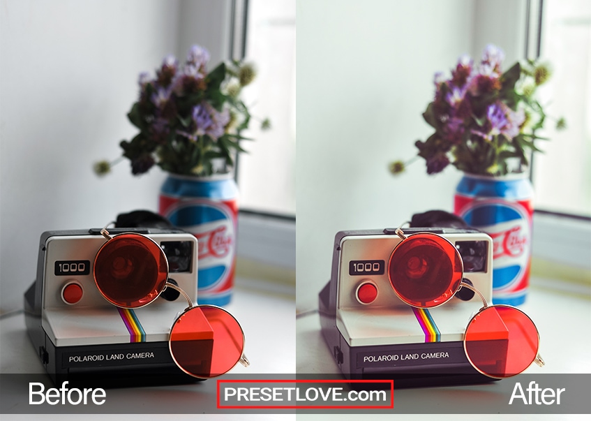 A vibrant Polaroid Spectra of a Polaroid camera with round red sunglasses on top of it