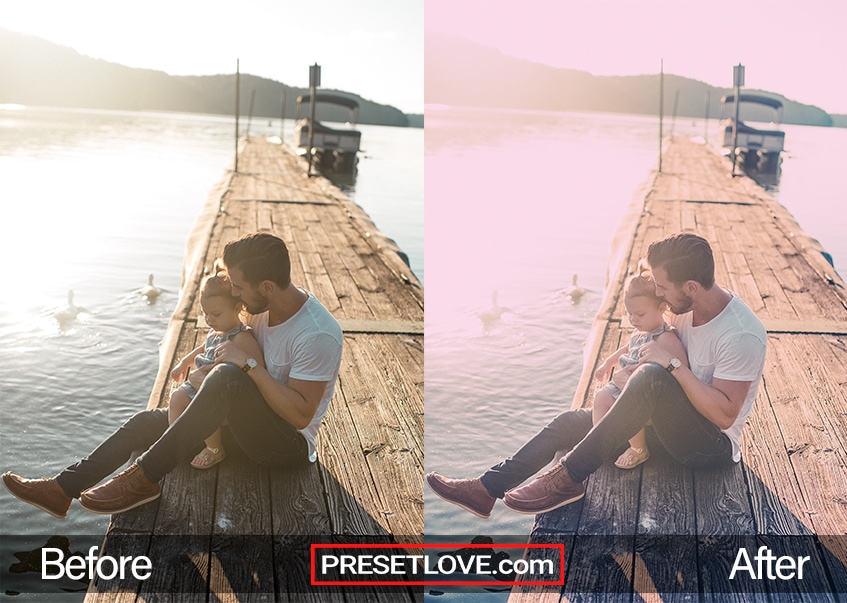 A soft pastel photo of a man with a baby in his arms while sitting at a dock