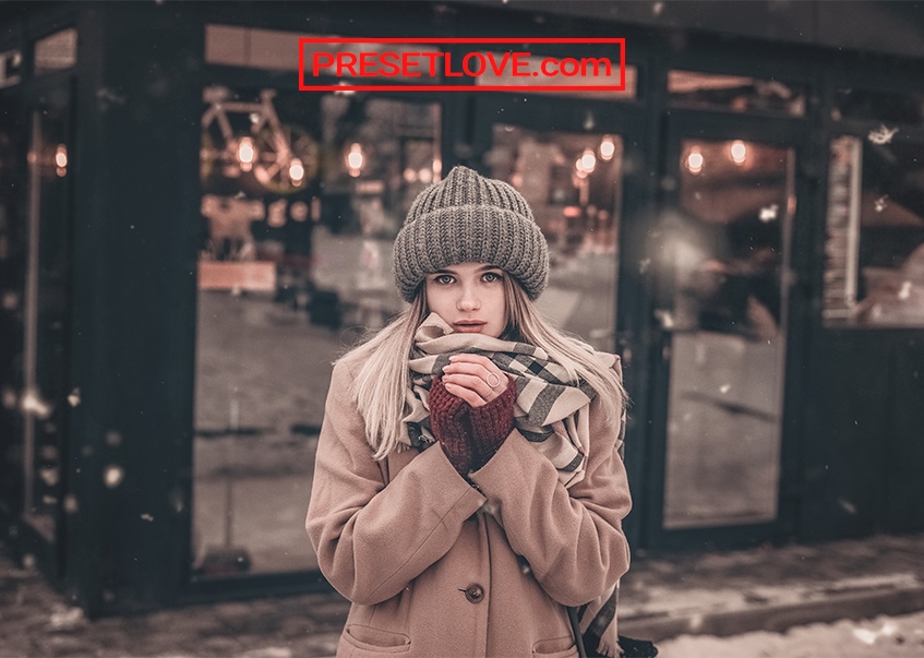 A cozy photo of a woman in winter clothing