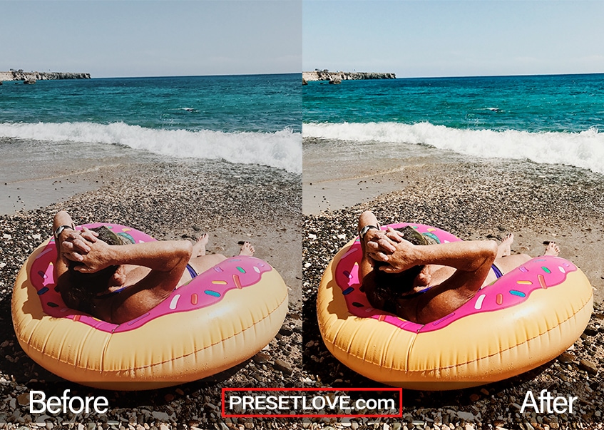 A woman lounging on the beach with a donut inflatable