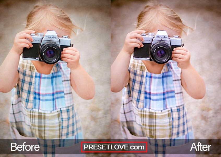 A charming photo of a little girl taking a photo with an analog camera