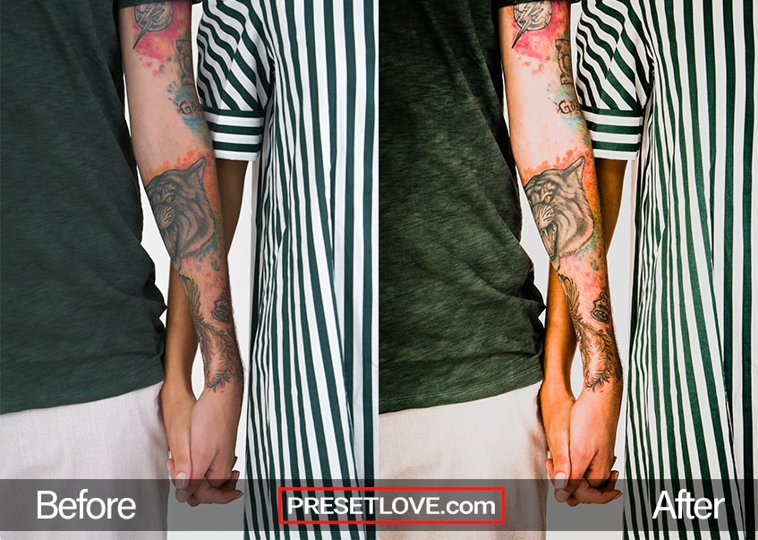 Arm with a vibrant tattoo, holding someone's hand