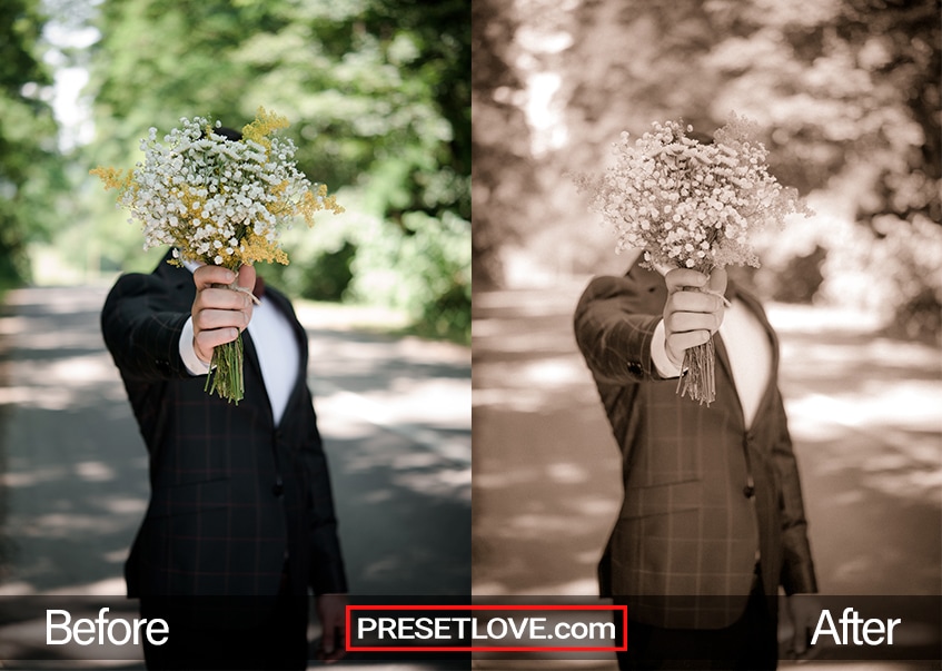 A soft sepia photo of a groom holding up a bouquet