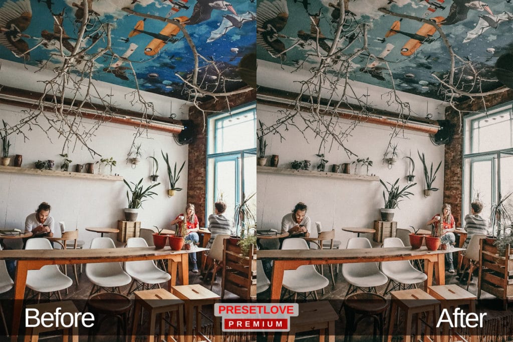 A light and airy photo of a cafe with airplanes painted on the ceiling