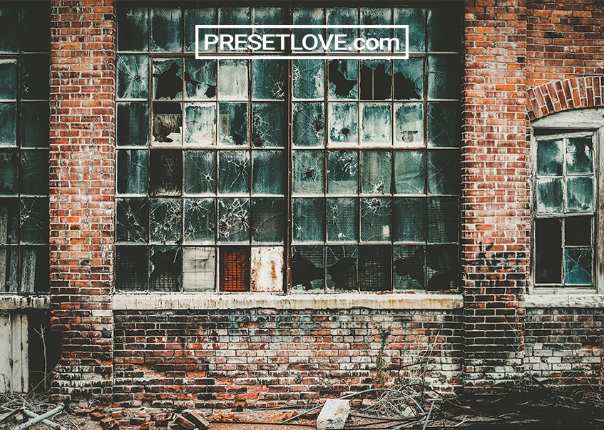 A gritty and grungy image of an abandoned brick building