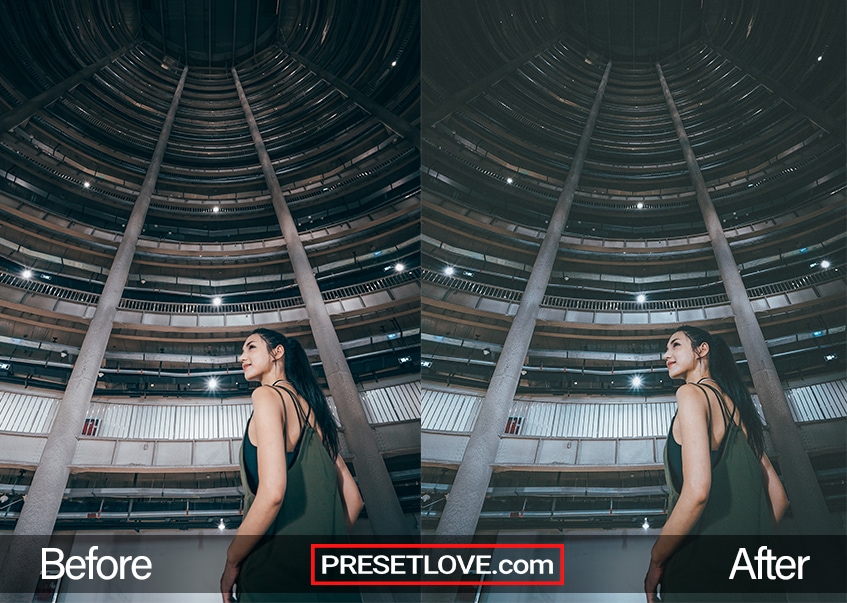 A low-angle shot of a woman standing at a building patio