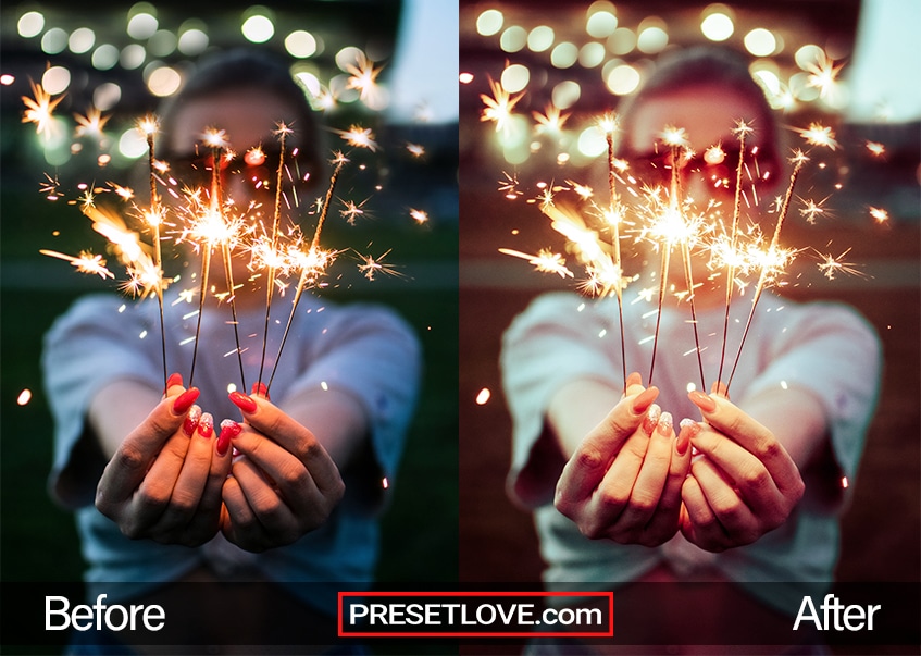 A girl holding up sparklers at the camera