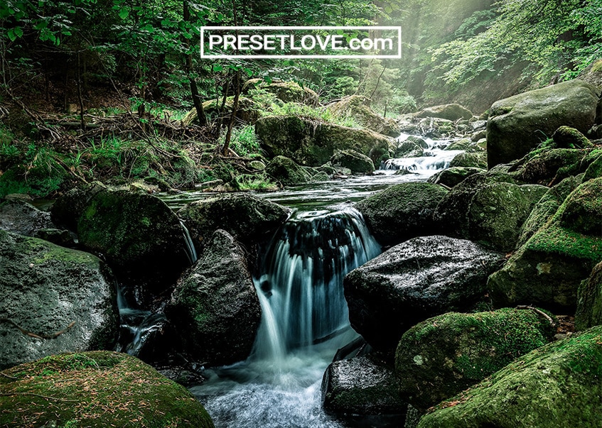 A vivid landscape image of a waterfall