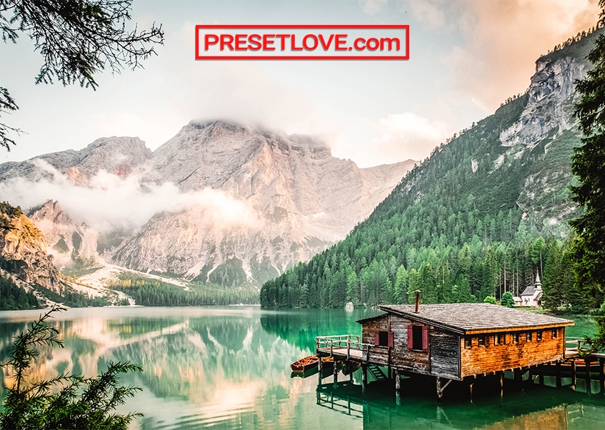 A vibrant photo of a landscape with clear waters and detailed mountains