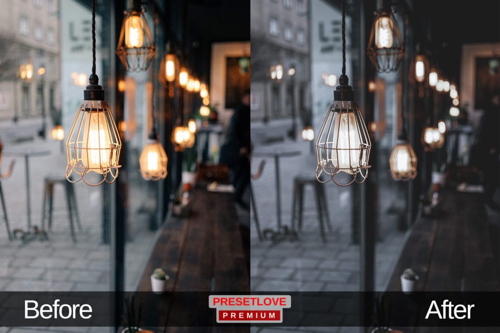 A dim and cozy cafe with light fixtures hanging in a row